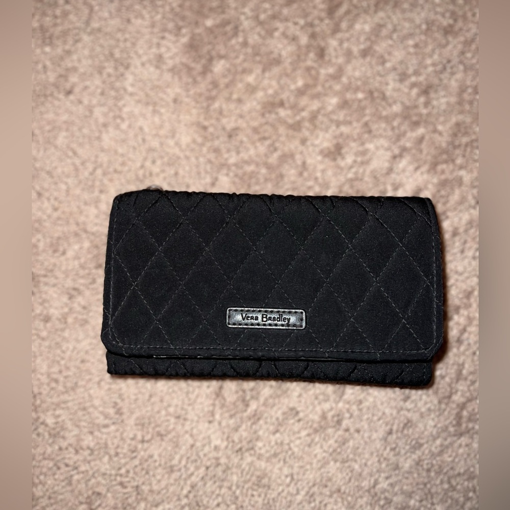 Vera Bradley wallet with rose pattern on inside.